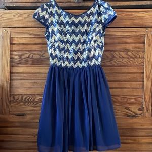 Very cute dress navy sequin and silver. Size 1/2. Excellent condition